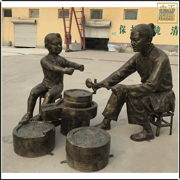 磨豆腐人物铜雕塑